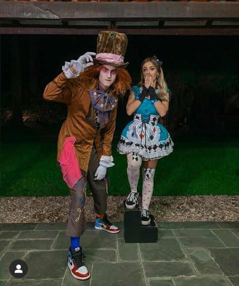 Couples Alice In Wonderland Costume, Halloween Costumes Women Couple, Elvira Couples Costume, Creative Cute Halloween Costumes For Women, Alice And Wonderland Couple Costumes, Ginger Couple Costumes, Alice And Mad Hatter Costume Couple, Halloween Customers For Couples, Couples Matching Halloween Costumes