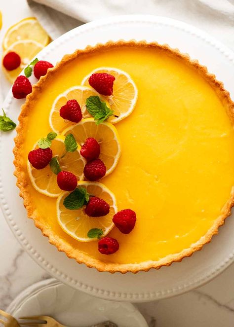 Overhead photo of French Lemon Tart decorated with raspberries and creme fraiche Lemon Tart Decoration Ideas, Lemon Tart Decoration, French Lemon Tart Recipe, Apricot Tart Recipe, Picky Bits, Tart Crust Recipe, Apricot Tart, Lemon Tart Recipe, French Tart