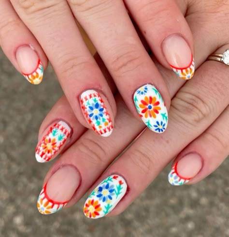 beach nails, flower nails, colorful french tip Latin Nail Designs, Mexican Style Nails French Tip, Spanish Inspired Nail Art, Viva Mexico Nails, Mexican Flower Nails Designs, Mexico Gel Nails, Spanish Nail Art, Spain Inspired Nails, Talavera Nail Art French Tip