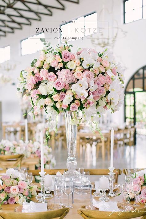 This stunning mass arrangement is everything! We love the roses, white, pink, raw wooden tables, white napkins, gold. wedding day, wedding table, best wedding ever, bridal table. Wedding Table Napkins, Blush Centerpiece, Events Company, Newport Wedding, Bridal Table, Tall Centerpieces, Wedding Venue Decorations, Bride Magazine, Blush Flowers