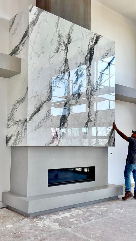 Marble For All Interiors | Our team recently installed this 20+ Feet Tall Contemporary Fireplace in this ultra-modern MONTCLAIR home . What do you guys think? .... | Instagram Tiled Fireplace Wall, Tv Camino, Modern Fireplace Ideas Living Rooms, Fireplace Modern Design, Fireplace Accent Walls, Contemporary Fireplace Designs, Luxury Fireplace, Granite Fireplace, Tall Fireplace