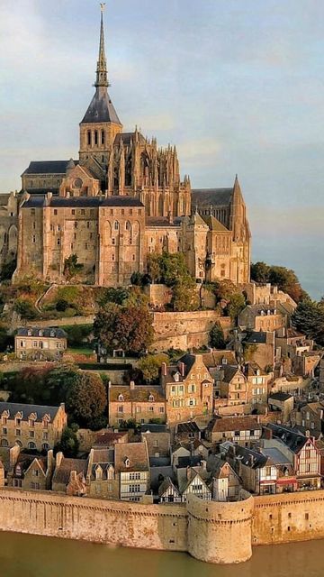 Sam & Jess on Instagram: "A medieval village perched on a rock in the sea! Have you heard of Mont Saint-Michel? 🇫🇷 #amazingplaces #hiddengems #bucketlist #montsaintmichel" Monte St Michel France, Mont St Michel France, Castle By The Sea, Mt St Michel, Mont Saint Michel France, Le Mont Saint Michel, Mont St Michel, Chateau Medieval, Packing Hacks