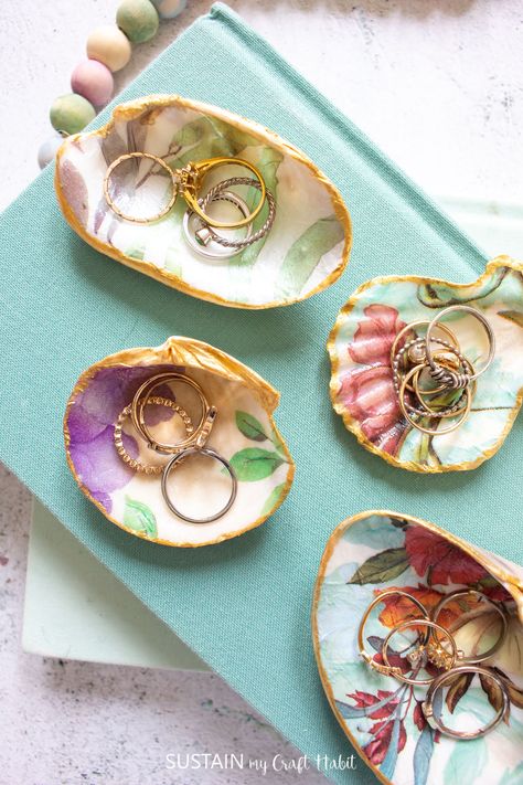 Learn how to create beautiful seashell trinket dishes crafted with mod podge. Perfect for adding a touch of cozy seaside charm to your home! #sustainmycrafthabit #seashelltrinketdishes #seashelldecor Sea Glass Window Art, Decoupage Shells, Crafts Upcycling, Fall Crafts For Adults, Decorative Paper Napkins, Mod Podge Crafts, Decoupage Wood, Decoupage Ideas, Glass Window Art