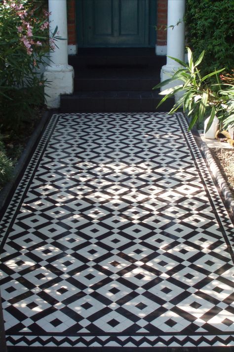 London Mosaic | Victorian Floor Tiles | Pathway | Contact us now for a free quote on 020 8699 0820 or email us at info@londonmosaic.com | #pathway #londonmosaic #mosaic #tiles #floortiles #victoriantiles Victorian Front Garden, Balcony Tiles, Black And White Tile, Victorian Floor Tiles, Paving Design, Porch Tile, Victorian Floor, Tiled Hallway, Garden Tiles