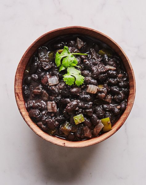 Cuban-Style Black Beans Recipe | Bon Appetit Magazine Cuban Black Beans And Rice, Black Beans Recipe, Cuban Black Beans, How To Soak Beans, Dried Black Beans, Recipe Web, Black Beans And Rice, Black Bean Recipes, Rice Food