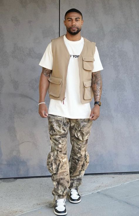 Cargo Mens Outfit, Fall Outfit Men Streetwear, Dreamville Festival Outfits Men, African Safari Outfit For Men, Men’s Fall Casual Outfits, Black Male Fashion Casual Street Style, Cargo Jacket Outfit Men, Beige And Orange Outfit, Mens Khaki Outfit