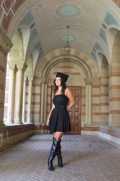 Grad photos, college high school graduation, university of california los angeles, LA, instagram post story inspiration, black dress belt tall black thighhigh boots, graduation cap, fashion, red brick architecture, dark academia Goth Graduation Dress, Graduation Dress University Black, Graduation Dress With Black Cap And Gown, Graduation Dress Black Cap And Gown, Gothic Graduation Pictures, Goth Baddie, Brick Architecture, Grad Photos, High School Graduation