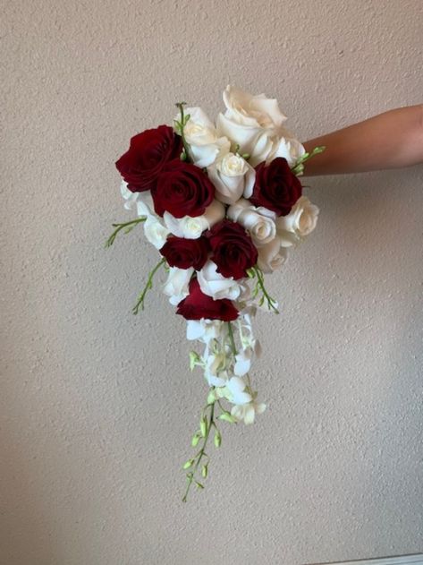 Elegant winter wedding bouquet, red & white roses with orchids. White And Red Bridal Bouquet, Winter Wedding Bouquet Red, Wedding Bouquet Red, Red Rose Bouquet Wedding, White Rose Bouquet, Dark Red Roses, Elegant Winter Wedding, Winter Wedding Bouquet, Red Rose Wedding