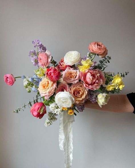 Spring bridal bouquet with tulips, ranunculus and garden roses Bouquet With Tulips, Ranunculus Bridal Bouquet, Tulip Bridal Bouquet, Ranunculus Wedding Bouquet, Spring Bridal Bouquet, Ranunculus Wedding, Garden Rose Bouquet, Colorful Bridal Bouquet, Wedding Flowers Tulips