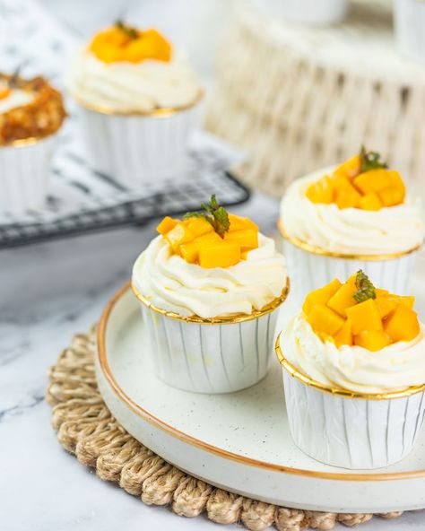 Mango cupcakes sound absolutely delightful! Here's a simple recipe you can try: Ingredients: 1 1/2 cups all-purpose flour 1 1/2 teaspoons baking powder 1/4 teaspoon salt 1/2 cup unsalted butter, softened 3/4 cup granulated sugar 2 large eggs 1 teaspoon vanilla extract 1/2 cup mango puree (from about 1 large ripe mango) 1/4 cup milk Papas Birthday, Mango Cupcakes, Ripe Mango, Mango Puree, Simple Recipe, Granulated Sugar, Unsalted Butter, 2 Cups, Purpose Flour