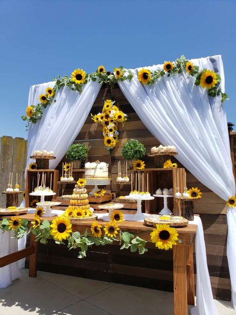 Feast your eyes on this splendid sunflower 1st Communion celebration! The dessert table is beautiful!See more party ideas d share yours at CatchMyParty.com #catchmyparty #partyideas #sunflowerparty #rusticparty #1stcommunion #holycommunion #desserttable Sunflower Party Theme Decoration, Sunflower Birthday Party Decoration, Sunflower Desserts, Sunflower Party Ideas, Sunflower Theme Party Decorations, Sunflower Party Theme, Sunflower Baby Shower Ideas, Sunflower Themed Party, Sunflower Theme Party