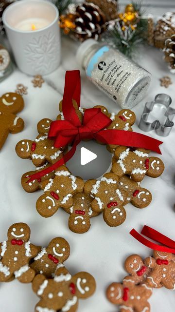 Maria Gomez on Instagram: "#sponsored I loved the mini gingerbread man wreath ornament from @michaelsstores so much that I just had to recreate it with cookies. To make these gingerbread cookie wreaths you will need:  Your favorite gingerbread cookie recipe  From @michaelsstores : Celebrate It 40 piece cookie cutter set Sweet Tooth Fairy bright white vanilla meltables  Sweet Tooth Fairy Crystal Sugar  Sweet Tooth Fairy Sparkle Edible Glitter in silver Celebrate It red ribbon   Use the mini gingerbread man cutter to cut out gingerbread cookies Place a circle cutter on parchment paper and place gingerbread men around the cutter to build a wreath. It is best to slightly overlap the legs and press down gently on the overlap so that the wreath does not break. You will need two per wreath.  Bake Cut Out Gingerbread Cookies, Mini Gingerbread Men, Homemade Gingerbread Man Ornaments, Gingerbread Wreath Cookie, Oh Snap Gingerbread Man Svg Free, Gingerbread Man Wreath, Gingerbread Diy Crafts, Glitter Gingerbread Ornament, Maria Gomez