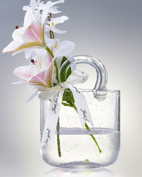 PRICES MAY VARY. 🌸FULL UPGRADE! MADE OF CRYSTAL! - Our product has eliminated the previous glass material and replaced it with crystal material! And greatly thickened, making this vase in the sun more shiny and dazzling and aesthetic. In the same series of products to achieve the best quality! Handle has also been thickened to make it more solid. 🌸BEAUTIFULLY PACKAGED - The vase is packaged in a beautiful gift box. You can give them as romantic gifts to your mom, girlfriend, wife, daughter, gr Purse Vase, Bag Vase, Glass Bag, Acrylic Vase, Clear Vase, Office Garden, Whimsical Garden, Art Deco Furniture, Bubble Glass