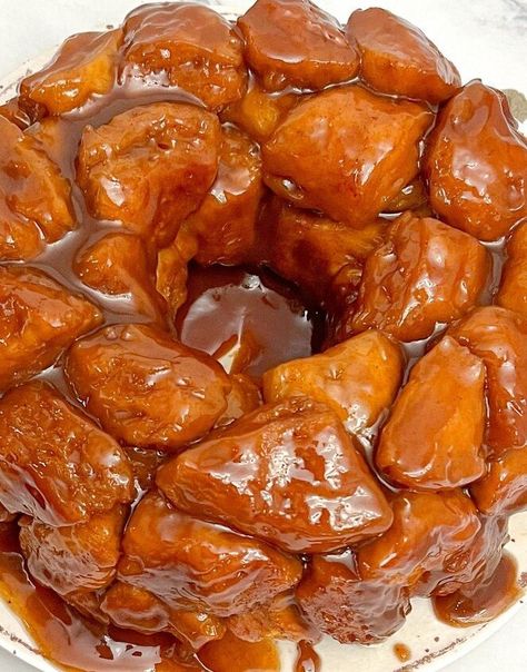 If you’re in search of the perfect pull-apart bread to bring to a gathering, then Monkey Bread is the way to go. Who could resist its fluffy, cinnamon-spiced dough and ooey-gooey, sticky glaze? Not to mention its fun, entertaining shape– a great conversation starter at any potluck. This article will explain exactly how to make Monkey Bread from scratch, giving you the tips and tricks necessary to create a delicious, show-stopping centerpiece that everyone will be asking about.Monkey Br… Sticky Pull Apart Bread, Monkey Bread Glaze, Pull Apart Sticky Buns, Oven Home Fries, Monkey Bread From Scratch, Easy Monkey Bread Recipe, Biscuit Monkey Bread, Pumpkin Monkey Bread, Monkey Bread Recipe Easy