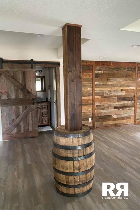 Wrapping Basement Beams, Whiskey Barrel Around Basement Pole, Basement Stairwell Ideas Rustic, Unique Basement Ideas Wall, Western Style Basement, Using Barnwood On Walls, Rustic Chic Basement, Brown Basement, Barndo Decor