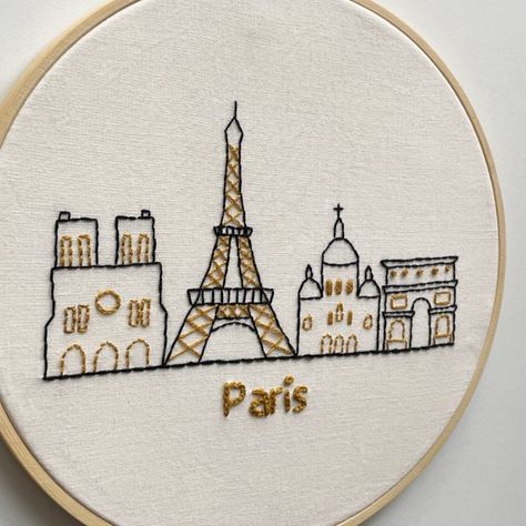 Paris Embroidery Pattern. Paris's most iconic buildings: Eifel Tower, Notre Dame, Arc de Triomphe, Sacré-Coeur. Embroidered in two colours black and yellow. Displayed in an embroidery hoop. Beginner Hand Embroidery, Paris Embroidery, Embroidery Pattern, Embroidery Art, Pdf Pattern, Paris France, Embroidery Patterns, Hand Embroidery, Monument