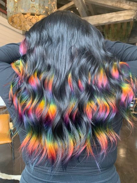 Summer Unicorn Hair: Pastel Rainbow Dream for the Brightest Look Dark Hair Rainbow Highlights, Peak A Boo Rainbow Hair Color, Black Hair With Rainbow Streaks, Prism Highlights Black Hair, Dark Brown Rainbow Hair, Black With Rainbow Hair, Dark Brown Hair With Rainbow Highlights, Black Hair With Vivid Highlights, Rainbow Highlights Black Hair