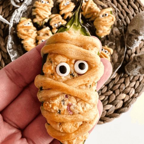 Halloween Pillsbury Jalapeno Popper Mummies - Lynn Mumbing Mejia Cresent Roll Dough, Jalapeno Peppers, Jalapeno Popper, Crescent Dough, Crumbled Bacon, Jalapeno Poppers, Halloween Snacks, Recipe Images, Shredded Cheese