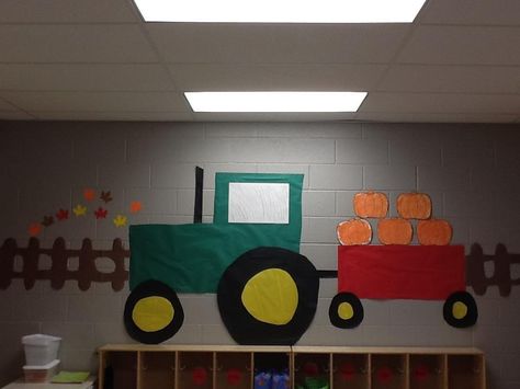 Our Tractor...store preschoolers seasonal arts and crafts on the trailer. flowers for Spring, pumpkins for Fall, and Christmas trees for Winter, etc... Tractor Construction Paper, Farming Classroom Theme, Tractor Bulletin Board Ideas, Farm Bulletin Board Ideas, Tractor Craft, Farm Classroom, Tractor Crafts, Farm Classroom Theme, Flowers For Spring