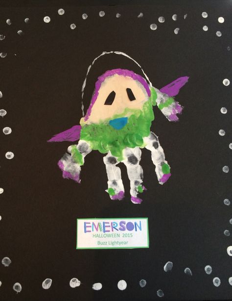 Buzz Lightyear Toy Story Handprint Art, Buzz Light Year Classroom Door, Buzz Lightyear Craft, Buzz Light Year Spaceship Diy, Halloween Handprints, Buzzlight Year Artwork, Buzz Lightyear Scrapbook Layouts, Toy Story Crafts, Paul Martin