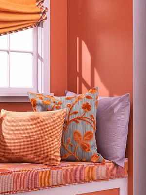 As hard as it can sometimes seem to achieve, a relaxing home is what we all crave. The "To Do" list will always be there, so why not try a laid-back color palette to take the edge off your decor -- and your days. Get started on a relaxing path with our paint color picks and room-by-room tips. Coral Paint Colors, Peach Bedroom, Coral Interior, Purple Bedrooms, Trending Paint Colors, Purple Bedroom, Bedroom Orange, Orange Decor, Cozy Pillow