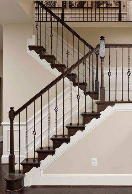 Wood Staircase With Iron Spindles, Cast Iron Staircase Spindles, Iron Spindle Staircase Wood Railing, Black Iron Spindles Staircase, Iron Balusters Stairs Modern, Iron Rod Staircase, Black Wrought Iron Staircase, Staircase Iron Spindles, Iron Spindles On Stairs