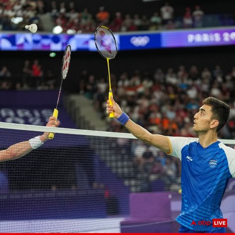 India's star shuttler Lakshya Sen experienced a heartbreaking 20-22, 14-21 straight-set loss to two-time World Champion Viktor Axelsen in the men's badminton semifinal at the Paris Olympics 2024 on Sunday. Regardless of the outcome, Lakshya Sen is assured of a medal match at Paris 2024. He will now compete in the bronze medal match against the other losing semifinalist, Malaysia's Lee Zii Jia, tomorrow at 6:00 PM IST (Indian time). #LakshyaSen #Badminton #BadmintonMensSingles #ParisOlympics... Lakshya Sen, Viktor Axelsen, Lee Zii Jia, Paris Olympics 2024, Olympics 2024, Paris Olympics, World Champion, Badminton, The Man