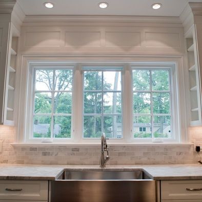 Carrara Subway Tile; paneling above window; shelves on the inside of cabinets. Description from pinterest.com. I searched for this on bing.com/images Kitchen Window Over Sink Ideas, Above Kitchen Sink, Window Over Sink, Kitchen Sink Window, Best Kitchen Sinks, Kitchen New York, Kitchen Tiles Design, Balkon Design, Subway Tile Kitchen