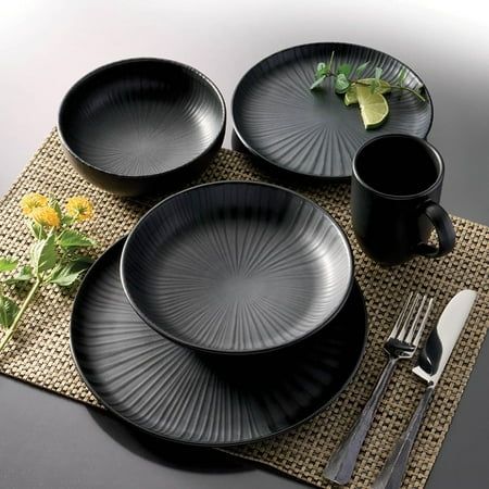 The Oxford Contempo dinnerware collection makes your meal the star of the show with its clean and simplified design making for an excellent foundation for creative plating. The collection's color scheme, rooted in cool tones found in nature, brings a sense of peace and well-being to even the busiest of homes. Oxford Contempo, Onyx Stoneware 20 Piece Dinnerware Set, Service for 4 SET INCLUDES 4 Dinner Plates - Size: 10.25 in (26 cm) 4 Dinner Bowls - Size: 8 in (20.3 cm) Capacity: 24 oz (710 ml) 4 Creative Plating, Hogwarts Great Hall, Black Dinnerware, Kitchen Improvements, Great Hall, Dinner Bowls, Stoneware Dinnerware, Black Plates, Plate Size