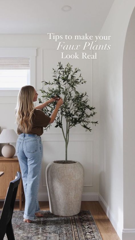 Faux Olive Tree Styling, Olive Tree In Bathroom, Olive Tree Faux, Feminine Rustic Decor, Olive Tree Dining Room, Best Faux Olive Tree Indoor, Olive Tree Decoration, Faux Olive Tree Living Room, Living Room Tree Decor