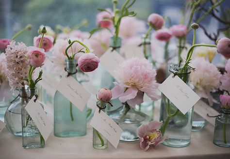 So pretty.....a bud vase and flower for everyone! Start saving small bottles, or visit antique and thrift shops. Castle Hill Inn Wedding, Low Centerpieces, Wedding Details Card, Deco Floral, Flower Ideas, Wedding Places, Table Cards, Wedding Place Cards, Look Vintage