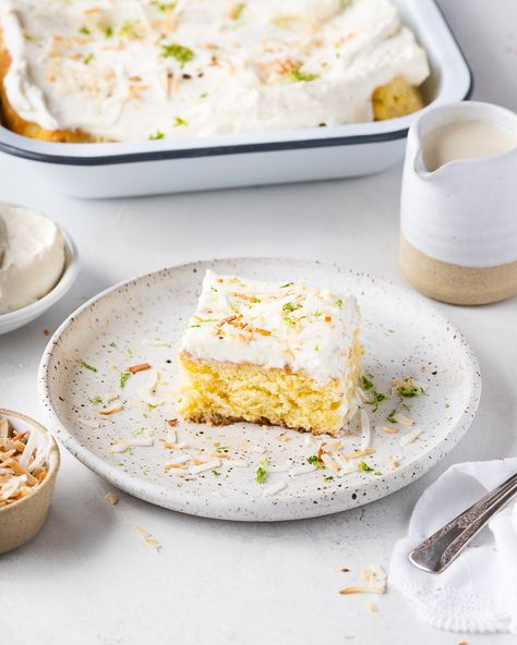 This light and spongy tres leches cake is dripping in a coconut milk syrup and topped with crunchy coconut and boozy rum whipped cream. It's not too soggy or too sweet! #treslechescake #coconuttreslechescake #coconutcake #cake #cincodemayorecipes Coconut Lime Tres Leches Cake, Lime Tres Leches Cake, Coconut Tres Leches Cake, Coconut Tres Leches, Traditional Mexican Desserts, Leches Cake, Milk Syrup, Tres Leches Cake, Unsweetened Coconut Milk