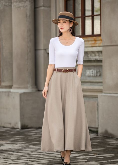 "Get dressed and out of the door in classic good looks with this pleated Long maxi skirt, crafted with soft cotton linen fabric, featuring pleated waist detail and two big pockets. DETAIL * More color https://etsy.me/3fsncV4 * 50% linen, 50% cotton * Has no lining, Not see through * Two pockets * High waistband * Back elastic waistband * Right Side zipper closure * Ankle length * Perfect for spring and summer, autumn * Wash by hand or machine with cold water *The model is 170 cm (5′7″) tall with Business Casual Long Skirt, Khaki Long Skirt Outfit, Full Length Skirt Outfits, Modest Style Inspiration, Elegant Skirt Outfits, Long Skirt Outfits For Summer, 2020s Fashion, High Waist Maxi Skirt, Long Linen Skirt