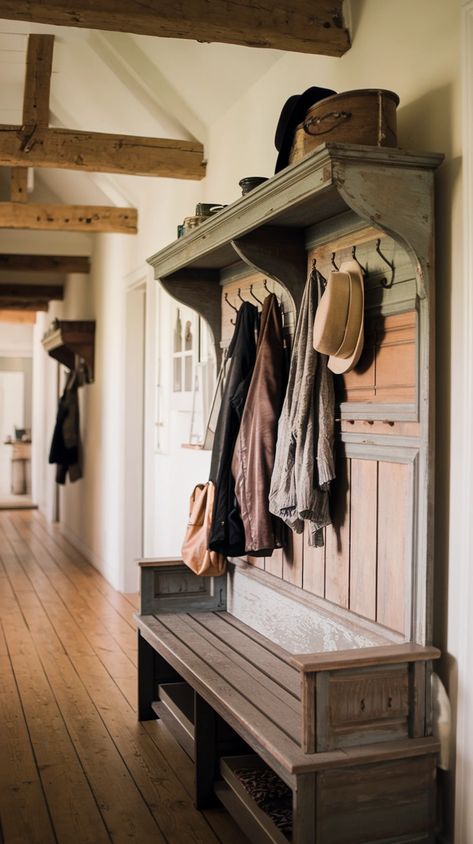 Organize your Farmhouse Hallway Ideas with a charming antique coat rack! This functional piece adds rustic character while keeping your entryway tidy. Our vintage-inspired coat racks offer practical storage for jackets, hats, and bags. Choose from wall-mounted or freestanding designs to suit your space. Combine with other farmhouse elements for a cohesive look. #AntiqueCoatRack #FarmhouseOrganization #RusticEntryway #VintageDecor #HallwayStorage Coat And Hat Rack Entryway, Mudroom Rustic Farmhouse, How To Organize Entryway, Entryway Jacket Storage, Hat And Coat Rack Wall, Vintage Hall Tree, Farmhouse Coat Rack Entrance, Wall Coat Rack Ideas Entryway, Coat Hanger Ideas Front Entry