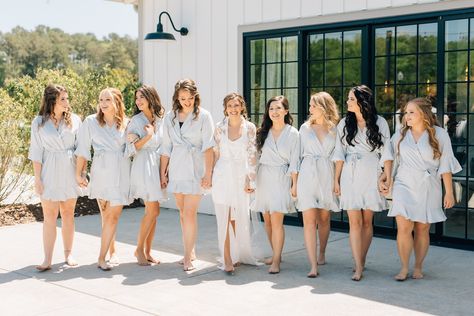 "As your wedding day approaches, you crave picture-perfect moments at every turn. Our ruffle bridesmaids robe are comfortable, fashion-forward robes that crafted with high-quality satin, offering a range of sizes and a spectrum color options. Personalize with a monogram for that final touch. Gift your bridesmaids our flounce ruffle robes, made of chiffon satin with a luxe matte finish. Featuring internal and external ties, these knee-length robes are a perfect surprise for the bridal party. Complete your wedding day with our kimono-style robes, easy to mix-and-match to create your unique bridal party look. Whether it's the maid of honor, mother of the bride, or bridesmaids, our white robe with delicate ruffles in sage green, emerald green, blush pink, or dusty rose will make them feel spec Bridal Party Robe Pictures, Gifts For Bridal Party, Robes Bridesmaids, Bridesmaids Robe, Bridal Party Robe, Bridesmaid Gifts From Bride, White Bridal Robe, Touch Gift, Wedding Party Robes