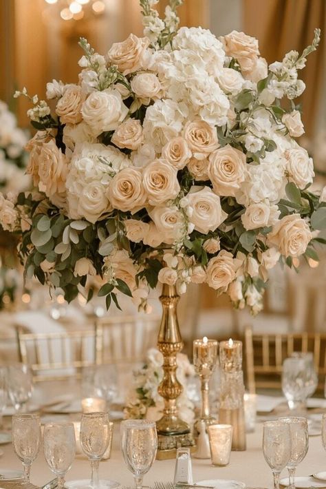 Timeless Elegance: Ivory and Blush Perfection White And Tan Floral Arrangements, Wedding Centerpieces Romantic Elegant, White And Cream Flower Arrangements, Champagne Wedding Theme Flowers, Elegant And Romantic Wedding Decor, Raised Centerpieces Wedding, Old Money Wedding Florals, Neutral Florals Wedding, White And Blush Wedding Decor