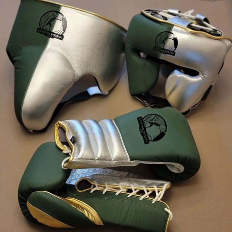 Custom Boxing Co, Genuine Leather Boxing Gloves, focus mitts! & Groin Guard Crafted with precision and designed for performance, our gear blends style and function seamlessly. Whether you're honing your skills in the ring or perfecting your technique in the gym, our equipment ensures comfort, durability, and optimal support. We're your one-stop manufacturing company for all things boxing equipment . Let your brand or club shine with custom-made gear tailored to your unique identity. Train li... Boxing Gloves Design, Boxing Trunks, Gym Art, Mma Gloves, Gloves Design, Boxing Equipment, Logo New, Boxing Gloves, Green Colour