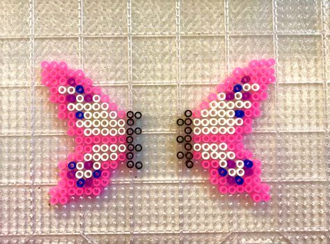 3d pattern for a butterfly made out of perler beads 3d Pearl Beads Pattern Easy, Iron Beads 3d Pattern, 3d Perler Bead Butterfly, Peeler Bead Butterfly, Pearler Bead Butterfly Pattern, Iron Beads Butterfly, Flower Perler Bead Pattern, Peeler Bead 3d Patterns, Fairy Perler Beads