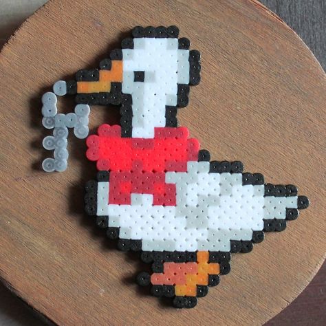 Dungeon Of Pixels (@dungeonofpixels) posted on Instagram: “Quack.  #artkal #artkalbeads #perlerbeads #perlerartist #perlerbrand #untitledgoosegame #perlerartist #goose” • Apr 10, 2020 at 9:27am UTC Goose Pixel Art, Hamma Beads Ideas, Hamma Beads, Beads Ideas, Iron Beads, Perler Bead Patterns, Bead Patterns, Perler Bead, Hama Beads