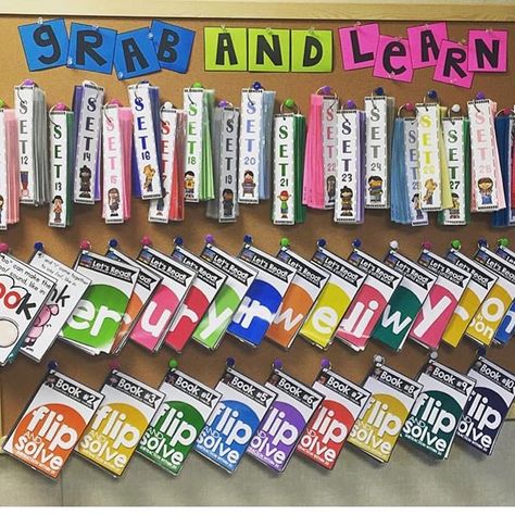 This "Grab and Learn" bulletin board is simply genius! No folders, bins, binders...no fuss! Thank you for sharing, Logan! The math and phonics flip books that you see (bottom two rows) are from my shop (shopayearofmanyfirsts.com). Reading Intervention Classroom, Intervention Classroom, Flip Books, We Are Teachers, Reading Specialist, Learning Support, Classroom Organisation, 3rd Grade Classroom, First Year Teachers