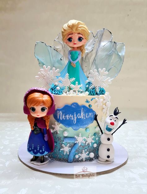 A Frozen theme cake done for a 7 year old! Cake in the flavor of Chocolate Truffle. Elsa and Anna are non edible here and all other decorations are edible... #Frozen #frozencake #elsacake #lildelightschennai #themecakes #birthdaycakes #birthdaycakeschennai #chennaibirthdaycakes #customizedcakes #cupcakesforkids #cakesinchennai #cakesforgirls #chennaicakeshop #prettycakes #chennai Anna Cake, Old Cake, Frozen Theme Cake, Elsa Cakes, Kid Cupcakes, Girl Bday Party, Elsa And Anna, Frozen Theme, Chocolate Truffle