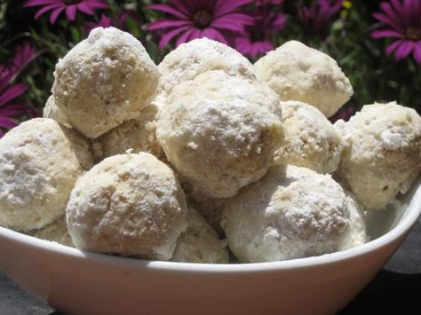 Tropical Hawaiian Snowballs.  I added two tablespoons of chopped, candied pineapple and doubled the coconut extract. Russian Tea Cakes Recipe, Tea Cookies Recipe, Russian Tea Cookies, Mexican Cookbook, Hawaiian Desserts, Tea Balls, Coconut Extract, Russian Tea Cake, Polynesian Food