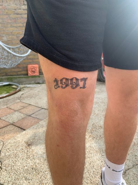 1997 1997 Knee Tattoo, 1997 Tattoo Ideas Men, Tattoo Ideas For Men Thighs, Front Thigh Tattoos Men, Mens Quad Tattoo, Lower Thigh Tattoo, Front Leg Tattoo Men, Cool Thigh Tattoos For Men, Front Thigh Tattoo