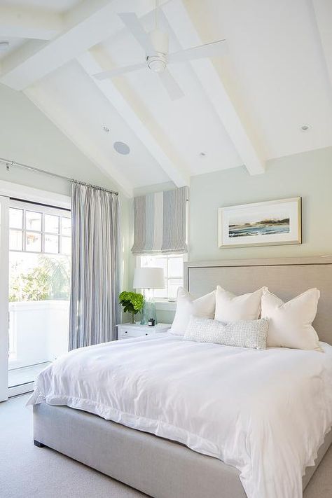 Vaulted Ceiling White Beams, Ceiling Fan Vaulted Ceiling Bedroom, Small Vaulted Ceiling Bedroom, Vaulted Ceiling Bedroom Master Suite Exposed Beams, Whitewash Beams, Tan Upholstered Bed, White Ceiling Beams, Bedroom With Vaulted Ceiling, Tan Headboard