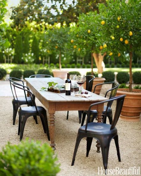 Browse these beautiful outdoor patios with pea gravel to inspire your own outdoor oasis | City Farmhouse Design Per Patio, Pea Gravel Patio, Backyard Dining, City Farmhouse, Farmhouse Patio, Lemon Trees, Gravel Patio, Outdoor Dining Room, Patio Inspiration