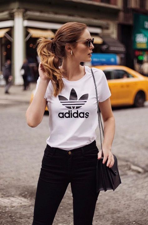 Cute Adidas Outfits For Women |  White Adidas T-shirt With Black Skinny Jeans - This casual outfit with the black Adidas Trefoil top is the perfect aesthetic! One of the cutest summer outfits for women. Image  LikeToKnowIt. This is an affiliate link. If Adidas Outfits For Women, Adidas Leggings Outfit, Adidas Outfits, Cute Adidas, Adidas Outfit Women, Summer Outfits For Women, Look Adidas, Adidas Originals Women, Adidas T Shirt