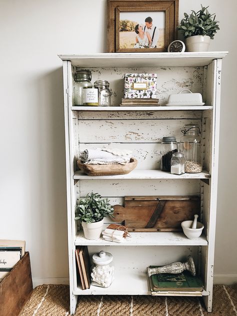 Milk paint bookshelf decor chippy white farmhouse rustic antique salvage kitchen shelf Rustic White Bookshelf, Bookshelf Nightstand Farmhouse, Antique Bookshelf In Kitchen, Rustic Farmhouse Bookshelf, Small Vintage Bookshelf, Rustic Bookshelf Ideas, Kitchen Bookshelf Ideas, Paint Bookshelf, Farmhouse Bookshelf Decor