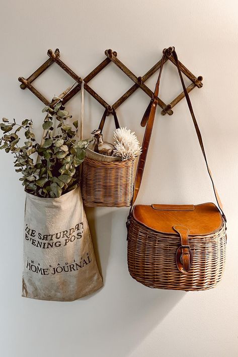 Basket On Wall, Vintage Spring Decor, Porch Refresh, Peg Wall, Spring Decor Ideas, Hanger Decor, Vintage Farmhouse Decor, Timeless Decor, Home Porch