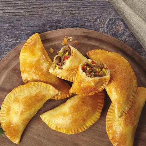 Empanadas Argentinas are beef empanadas that Argentineans serve as appetizers at parties or as a simple, everyday lunch or dinner. Empanadas Argentinas are always baked instead of fried, so your family can enjoy them regularly, too. Make them in no time with authentic, pre-prepared GOYA® Tapas Hojaldradas – Puff Pastry Dough for Turnovers. These beef empanadas—seasoned like empanadas you find in Buenos Aires—will delight anyone, no matter where you are. Empanadas Recipes, Goya Recipe, Beef Empanadas Recipe, Chicken Empanadas, Empanadas Dough, Beef Empanadas, Puff Pastry Dough, Empanadas Recipe, Latin Food