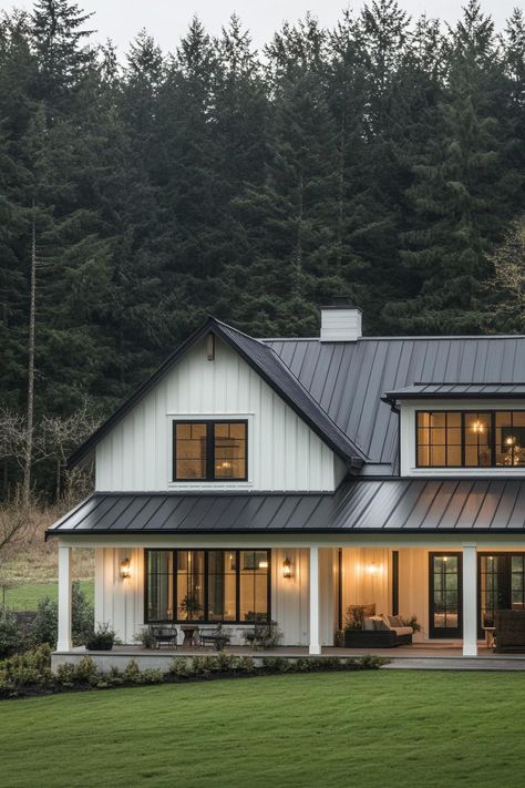 Modern farmhouse with a metal roof surrounded by trees. Homes with sprawling acreage offer more space for both your wildest dreams and that ever-growing collection of garden gnomes. Houses With Land, White Metal House, Homes With Land, House With Land, Farmhouse Architecture, Suburban House, Dormer Windows, Garden Gnomes, Brick Facade